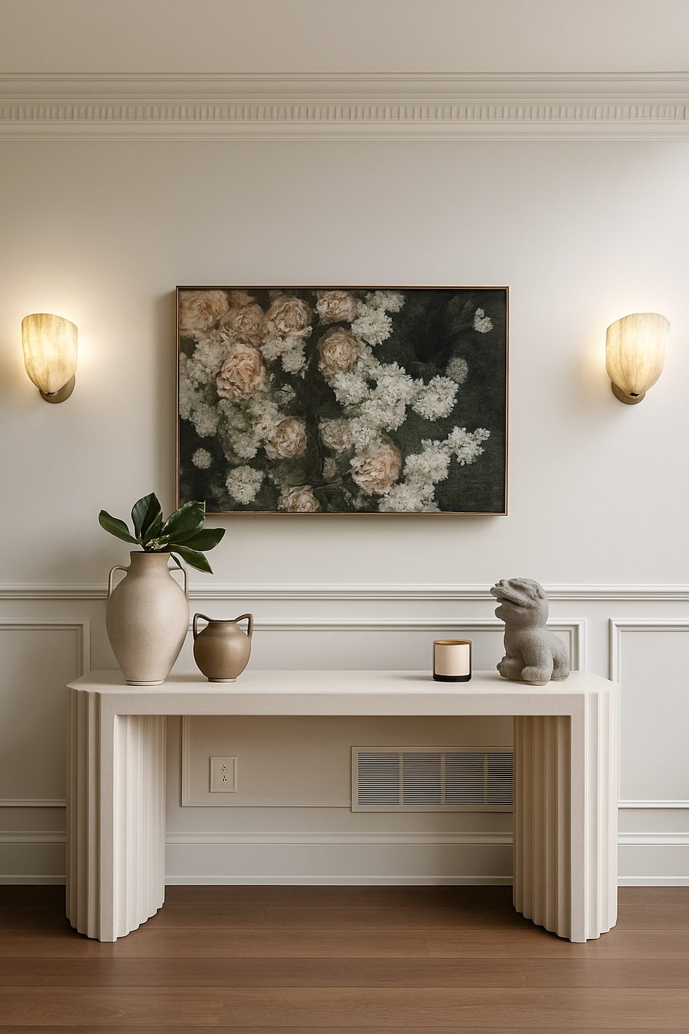 Fluted console table with floral artwork and sconces — Midtown Toronto interior design by Erica Yolevski Design Studio